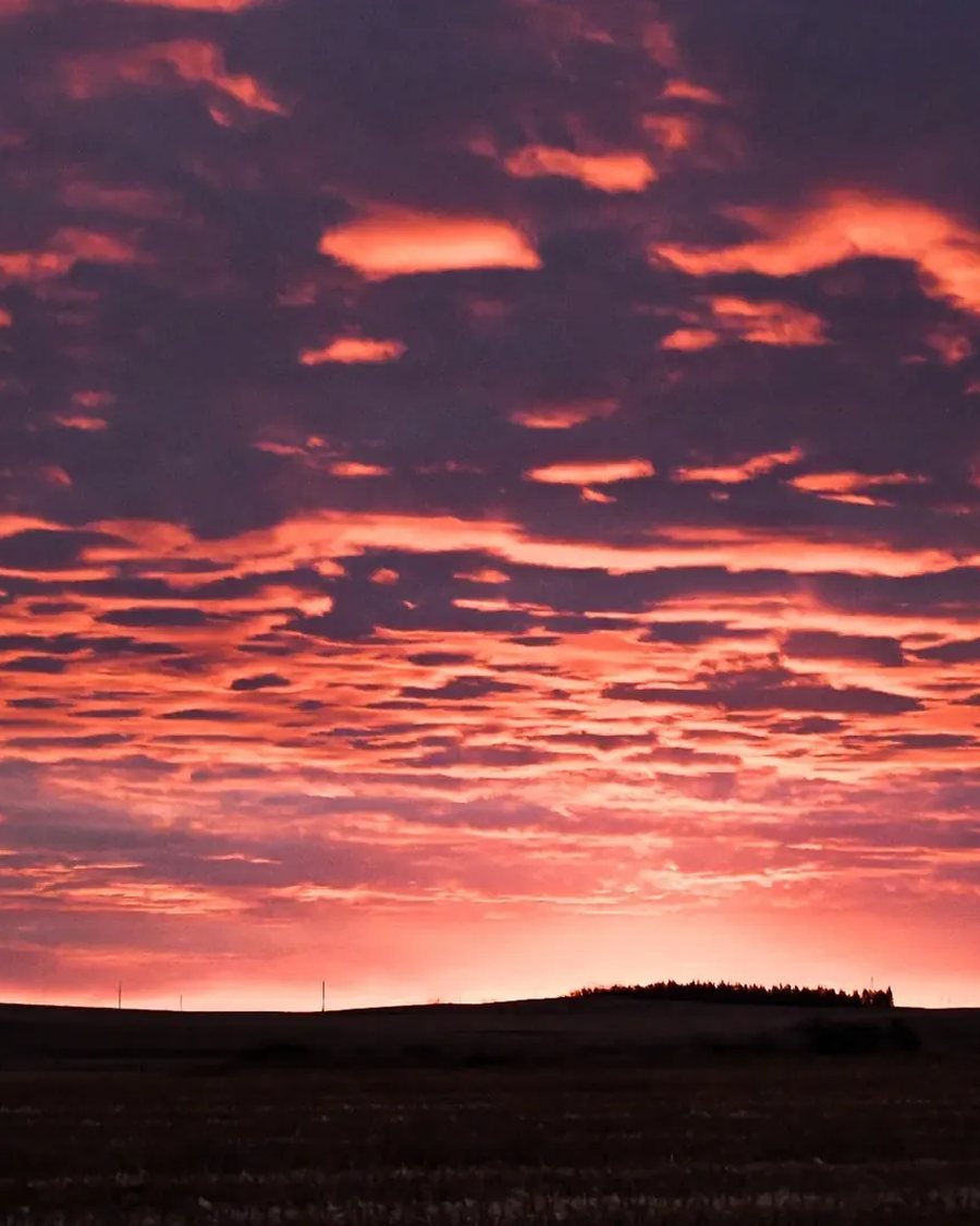Fiery sunset over the North Dakota Badlands photographed by Rhoda J. Dutchak